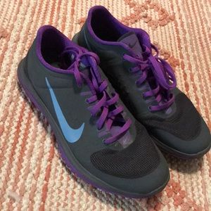 Gray and Purple Nike shoes